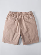 Beiget chino-shortsit takaa