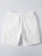 Valkoiset chino-shortsit takaa