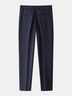 Laivastonsiniset kapenevat slim fit -housut takaa