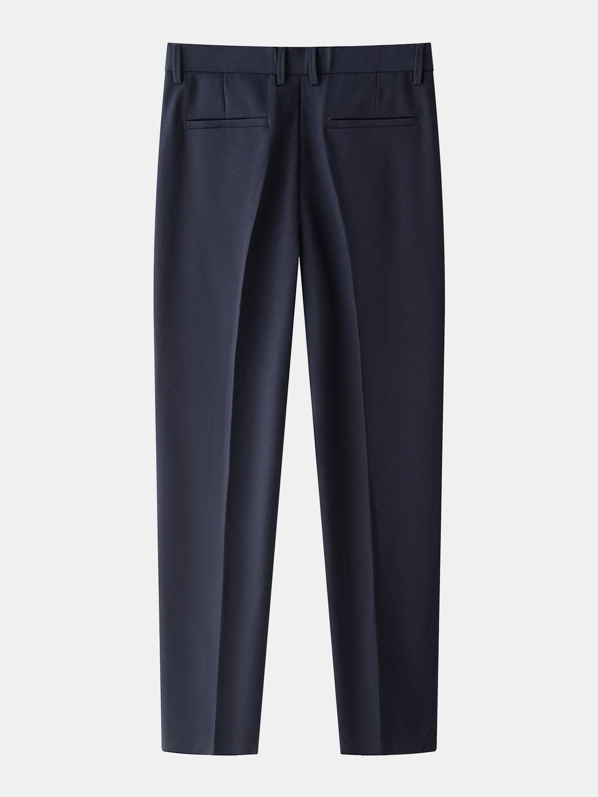 Laivastonsiniset kapenevat slim fit -housut takaa